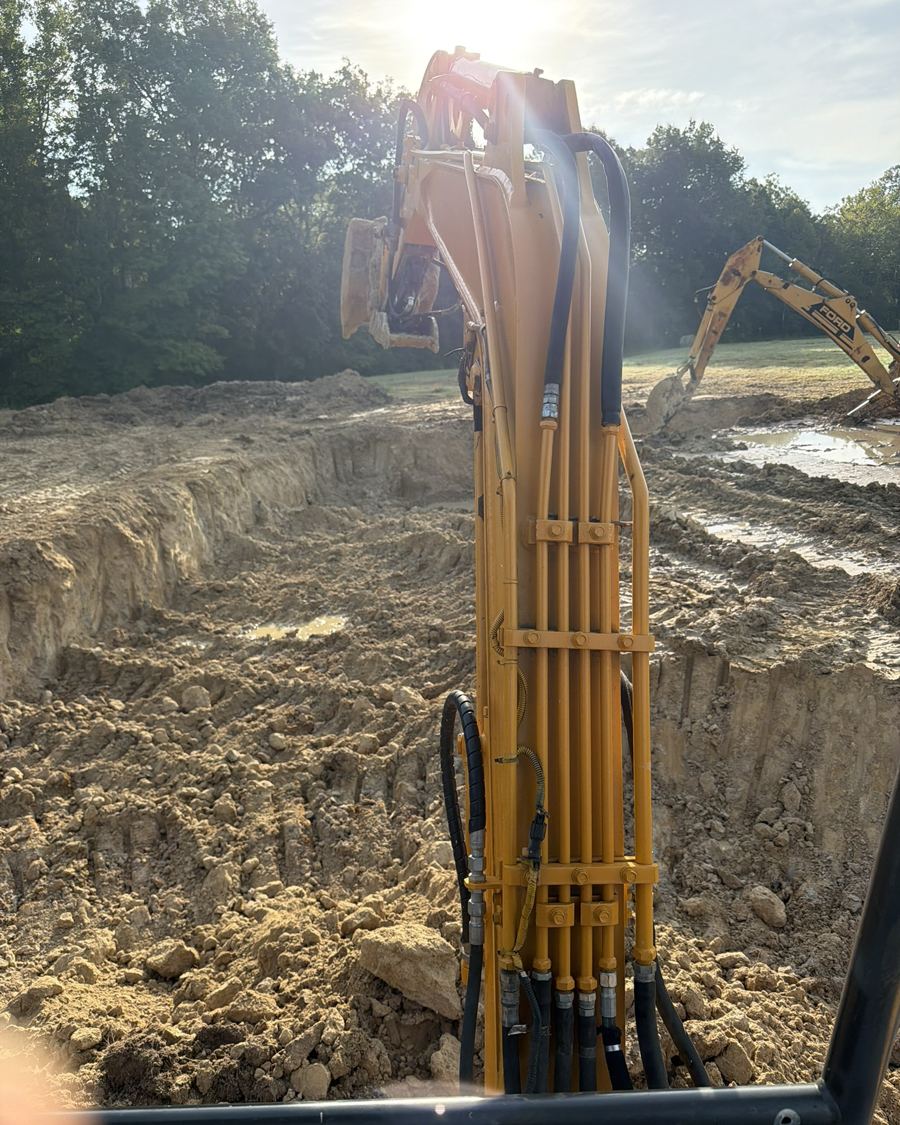 Excavator digging the basement hole